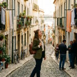 Woman exploring a historic neighbourhood on foot, discovering local streets and everyday life beyond the main tourist attractions.