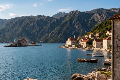 View across the Bay of Kotor in Montenegro with mountains and historic waterfront villages