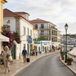 Walkable coastal neighborhood with cafés, local services, and waterfront promenade in Portugal.