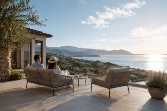 Modern coastal home with a sea view, illustrating how climate and location influence retirement living abroad.