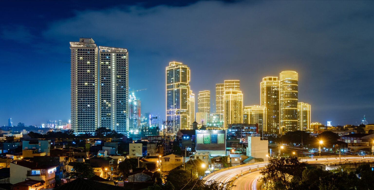 Modern skyline of Metro Manila, Philippines, highlighting the country's urban infrastructure and healthcare accessibility